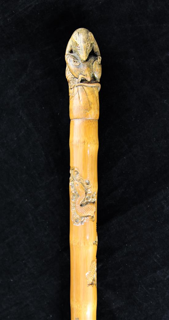 A Japanese carved bamboo walking stick, 36in.